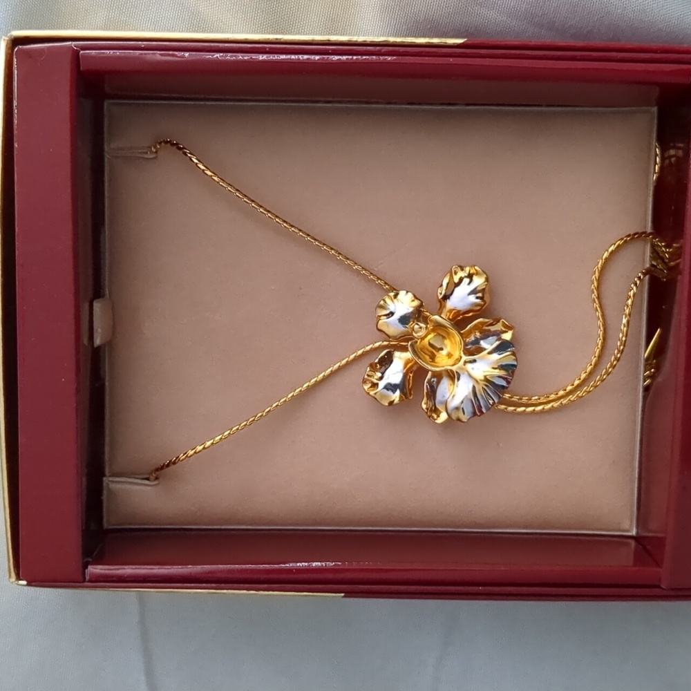 Risis Dipped Orchid Necklace purchased in Singapore. Brand new never worn.